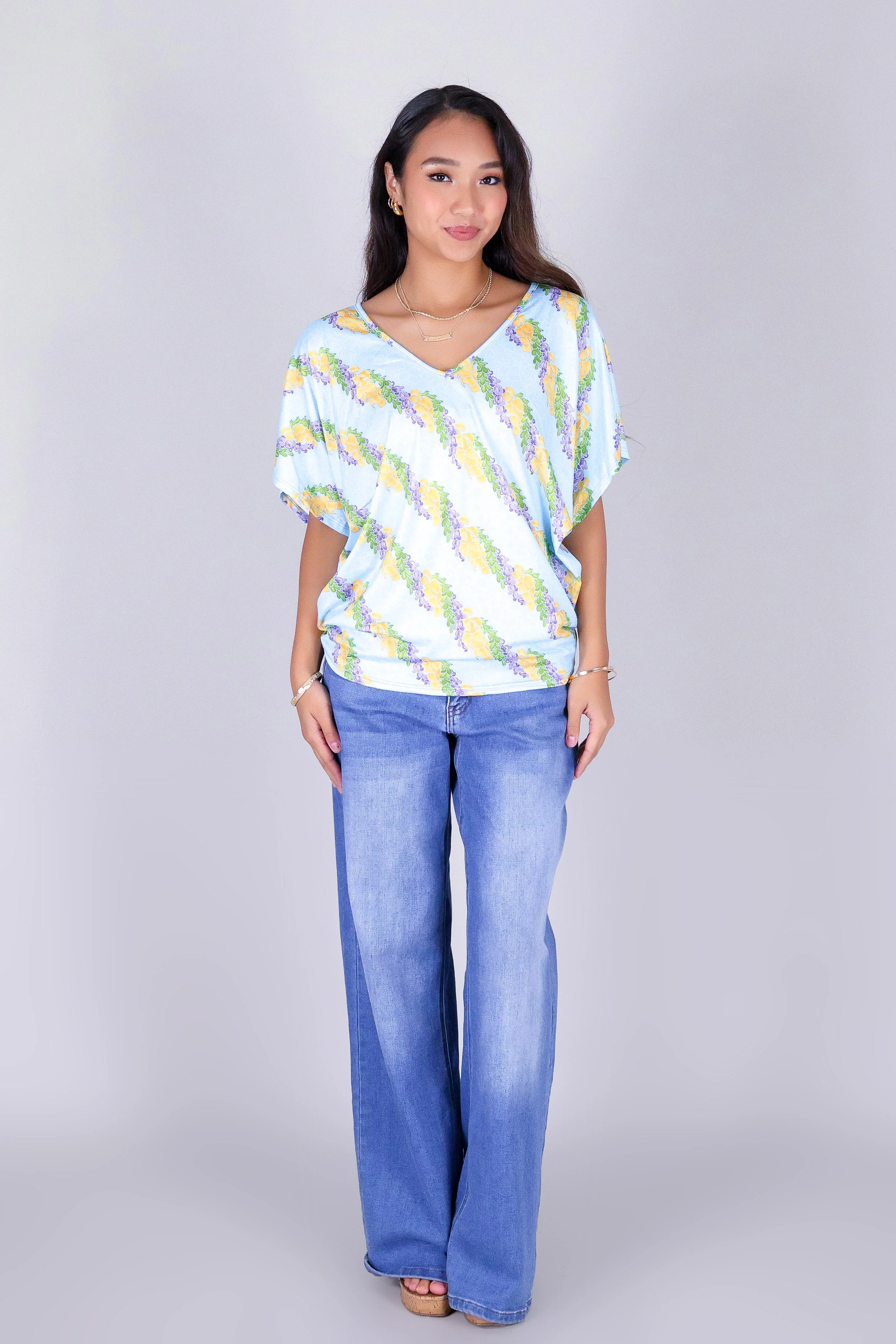 TWISTED LEI DOLMAN TOP